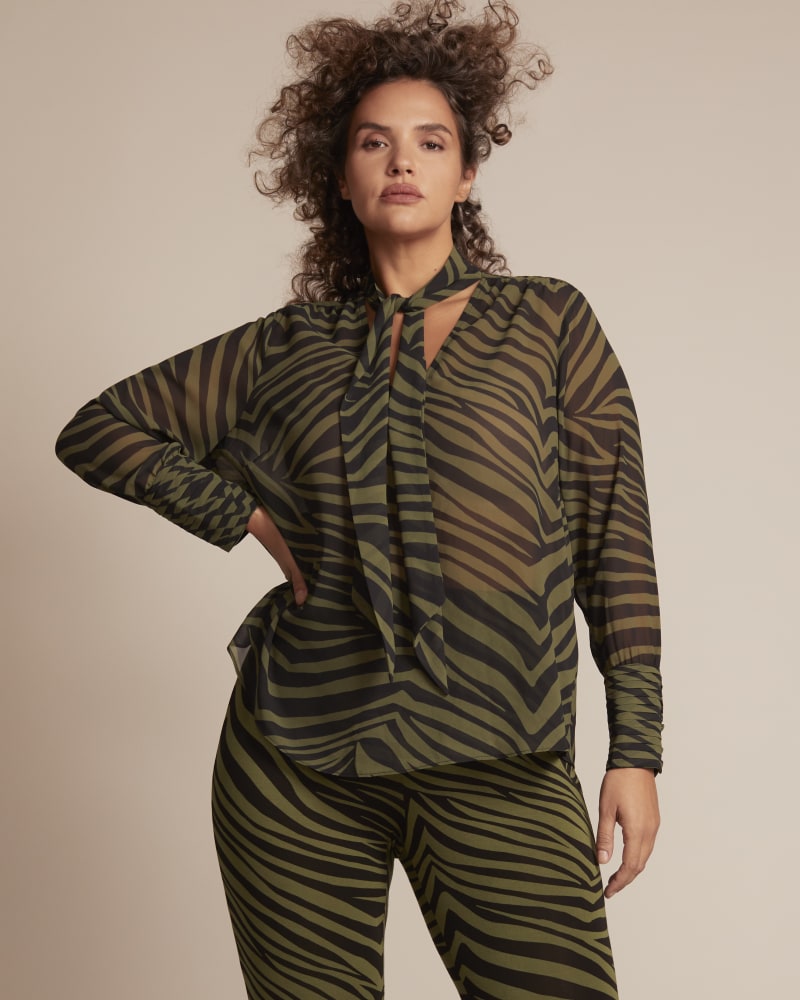 Front of a model wearing a size 14 Tracey Blouse in Olive Green / Black by 11 Honoré Collection. | dia_product_style_image_id:245300